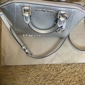 Mid Size Crossbody Handbag.